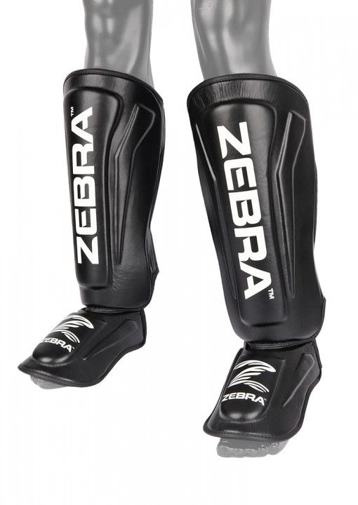 Zebra Pro protectores de espinillas y empeine, negros