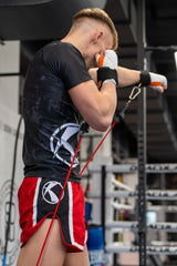 Katsudo Huricane pantalones cortos de muay thai, rojos