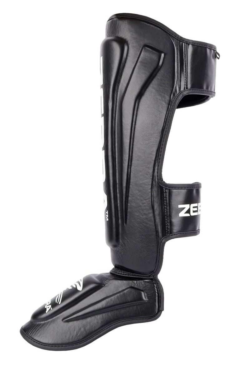 Zebra Pro protectores de espinillas y empeine, negros